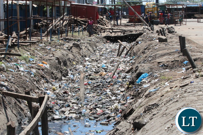 Lumumba drainage along City Market bus station before the Army clean up