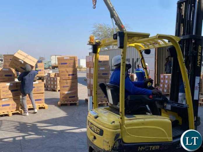 forklifter offloading containers