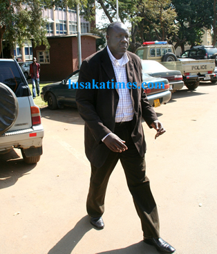 Former ministry of health permanent secretary Simon Miti leaving the Zambia Police Service headquarters.